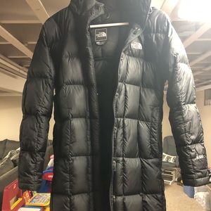 Women’s size S, black north face jacket.